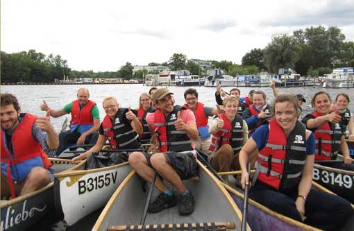 Company outing by canoe